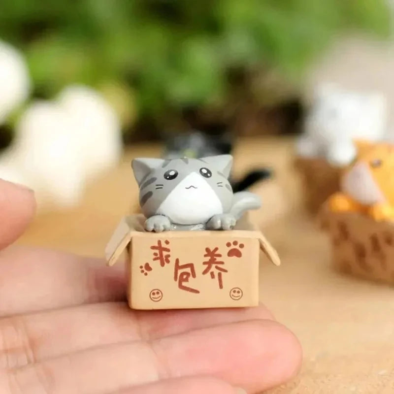 Conjunto de 4miniaturas de gatinhos para decoração .