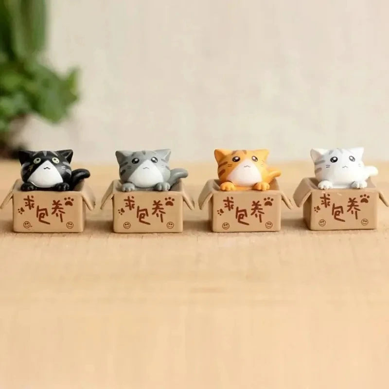 Conjunto de 4miniaturas de gatinhos para decoração .