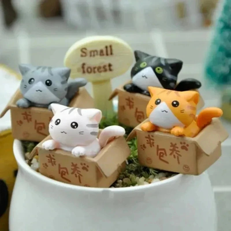 Conjunto de 4miniaturas de gatinhos para decoração .