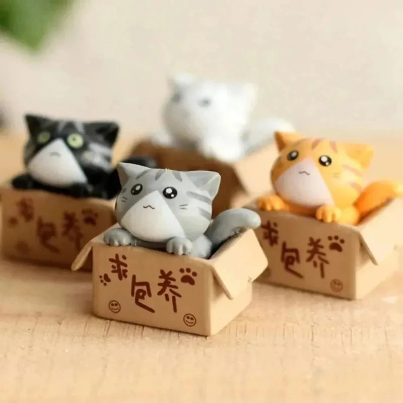 Conjunto de 4miniaturas de gatinhos para decoração .