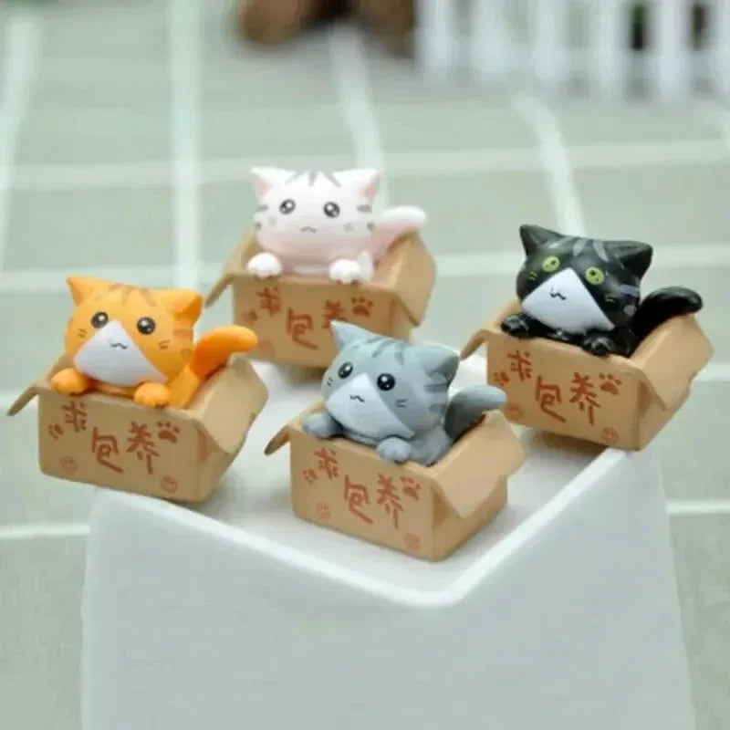 Conjunto de 4miniaturas de gatinhos para decoração .